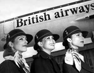 British Airways stewardesses show off a classic and elegant new uniform designed by top