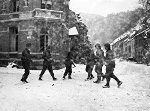 British and American patrols meet in the Belgian town of La Roche