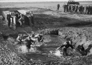 British Army Commando troops in training learn to surmount every obstacle
