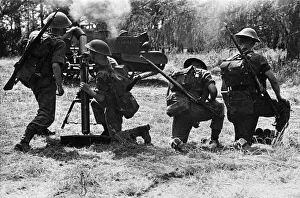British army soldiers set up a detachment of 3 inch mortars during training exercise