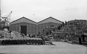 Warehouses Prints: British Army stockpile feed and hay for their horses on a Boulogne dockside before
