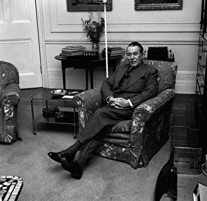 Armchair Prints: British author Dennis Wheatley poses for portraits in his home. 7th January 1964