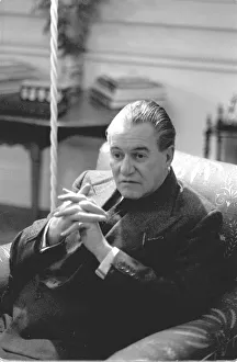 British author Dennis Wheatley poses for portraits in his home. 7th January 1964
