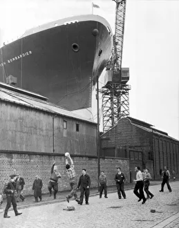 Marine Prints: The British Bombardier Cargo ship towering over the surrounding warehouses at Clyde