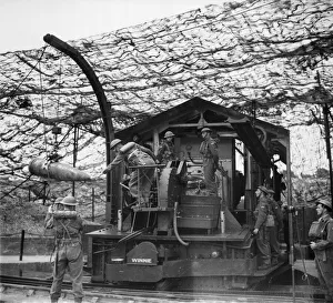 Munitions Prints: A British cross-Channel gun in action on the South Coast of England