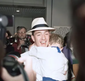 British cyclist Chris Boardman on arrival at Manchester airport as he returns home