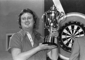 01164 Prints: British dart player Eric Bristow celebrates his victory in the Embassy Darts World