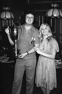 British darts player Eric Bristow celebrates his victory over John Lowe in the Final of