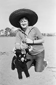 Holidaymakers Prints: British darts player Eric Bristow poses in a sombrero on the beach at Torremolinos Del