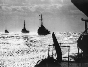 British destroyers at sea. Destroyers silhouetted against the skyline