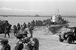 British re enforcement land on Gold beach for the big push into the Normandy town of Caen