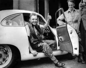 Thumbs Up Prints: British formula one racing driver Brian Naylor gives the thumbs up to his new Jaguar car
