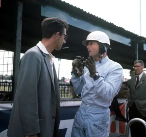 British Grand Prix 1962 Aintree July 1962 Phil Hill of Ferrari talking to unknown