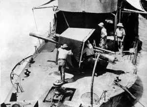 Pith Helmets Prints: The British gunboat HMS Firefly seen here in action on the Tigris River before being