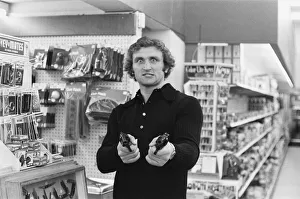 00328 Prints: British Heavyweight Champion Joe Bugner seen here in a Las Vegas supermarket posing with