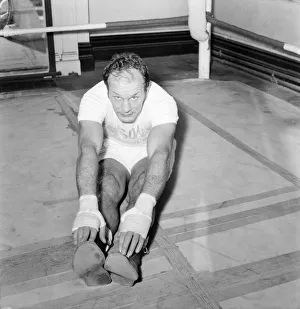 Stretching Prints: Former British Heavywight Boxing Champion Henry Cooper today had his first gym work-out