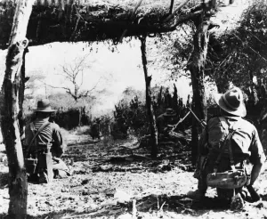 01455 Prints: British infantrymen search Japanese foxholes in Meiktila during Second World War