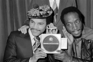 British light heavyweight boxer John Conteh (left) and Music Man