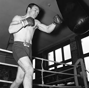 Punchbag Prints: British Lightweight champion boxer Dave Charnley training at the Thomas A