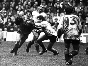 British Lions v Rest of The World. R Jones of the British Lions races ahead with the ball