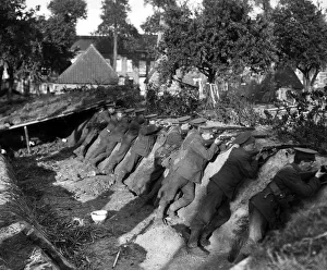 Trenches Prints: British Marines take up defensive positions in a trench on the outskirts of Lierne. 1914