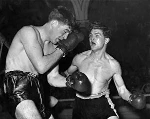 00059 Prints: British middleweight boxer Johnny Sullivan in action against Michael Stackduring their