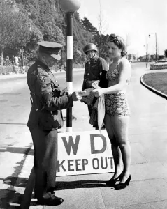British Military police and US army Security Police stop Carole Littlewood on her way to