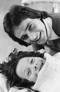 00964 Prints: British Motorcycle road racer Barry Sheene with young fan Tony Vickers who is undergoing