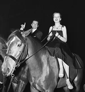 British musician Ronnie Ronalde and Bride Corsie on horseback