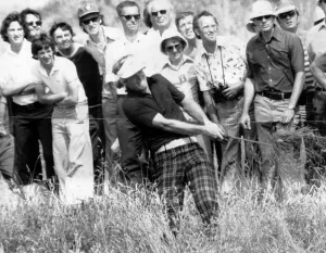 00129 Prints: British Open 1976. Johnny Miller thrashes his way out the rough on the 13th during