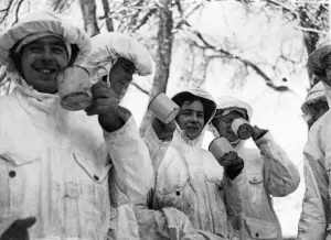 Ardennes Prints: British patrol team dressed in white camouflage cloaks for their reconnaissance missions
