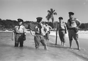 Leeward Islands Prints: British Policemen on the Caribbean Island of Anguilla August 1969 seen here cooling off
