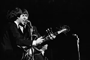 00587 Prints: British pop group The Beatles performing on stage at the Cow Palace in San Francisco