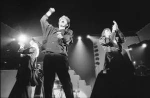 British pop group The Thompson Twins performing on stage during a concert in Oxford