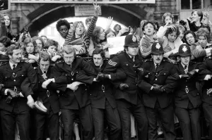 British pop singer David Bowie arrives home at Victoria Station