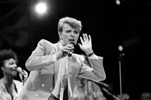 00542 Collection: British pop singer David Bowie performing on stage during the Live Aid concert at Wembley
