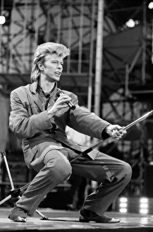 British pop singer David Bowie performing on stage at Wembley. 20th June 1987