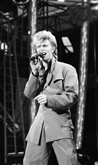 British pop singer David Bowie pictured performing in concert at Wembley
