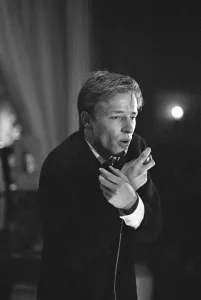 Microphones Prints: British pop singer Mike Sarne performing on stage with his band