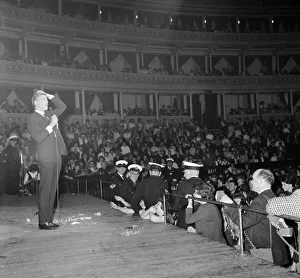 British pop singer Mike Sarne performing on stage at the Pop Prom at the Royal Albert