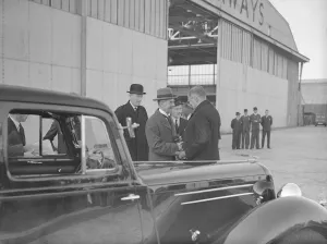 Build Up Prints: British Prime Minister Neville Chamberlain shakes hands with a German embassy official