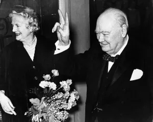 00723 Prints: British Prime Minister Winston Churchill gives the famous V Sign as he stands with Lady