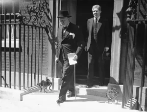Railings Prints: British Prime Minister Winston Churchill leaving Number 10 Downing Street to make a