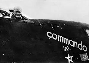 British Prime Minister Winston Churchill looks out from his personal aircraft