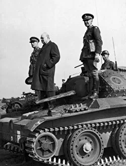Images Dated 19th October 2011: British Prime Minister Winston Churchill standing on a 'Covenanter'tank