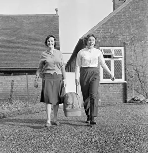 British racing drivers Pat Moss and Ann Wisdom after their victory in the Ladies Cup race