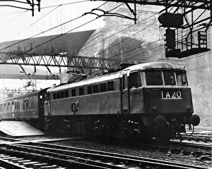A British Rail express Class 85 electric locomotive train