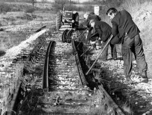 British Railways workmen lever a length of rail from its chairs on the old Nuneaton-Ashby
