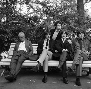 British rock group The Kinks pose in the gardens opposite the Flaghouse in Charing Cross