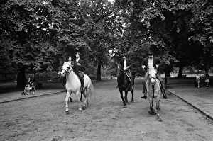 British rock group The Kinks pose on horses in the gardens opposite the Flaghouse in